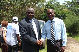 NEC Chairman Jerome G. Korkoya (left) and IREX Liberia's Chief of Party Bill Burke (right)